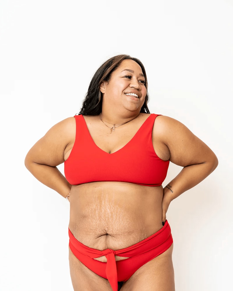Front of a model wearing a size XXL Rose Ribbed Reversible Bikini Top in Red by Gold Elite Apparel. | dia_product_style_image_id:283807